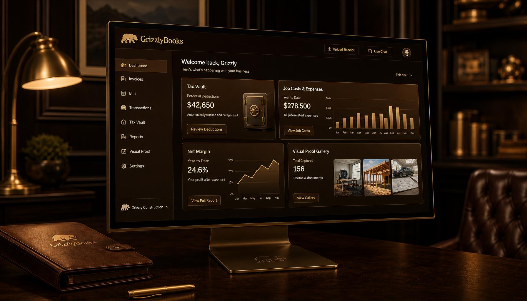 GrizzlyBooks dashboard displayed on a sleek desktop monitor in a premium dark leather and gold workspace